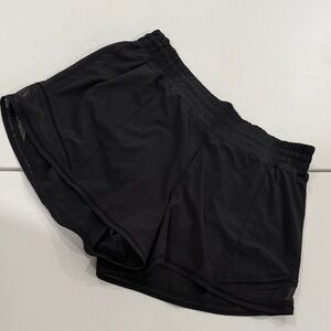 Lululemon Athletica 
Hotty Hot HR Short- lace trim, size 12 black
